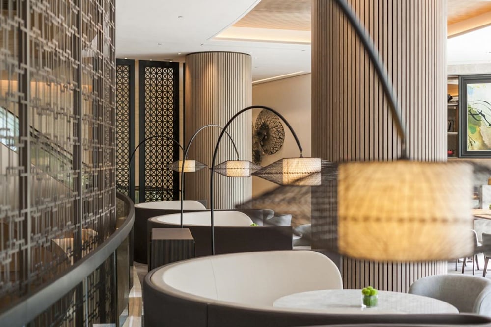 Фото New World Millennium Hong Kong Hotel