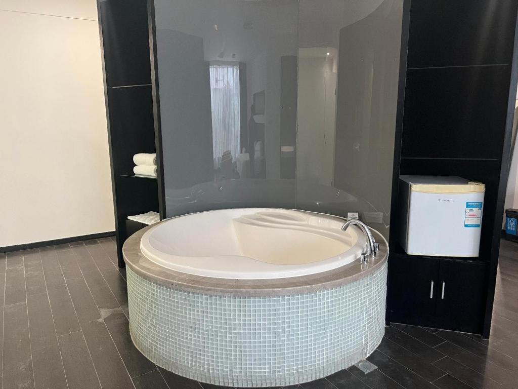 Фото Guangdong Nanmei Osotto Hotel