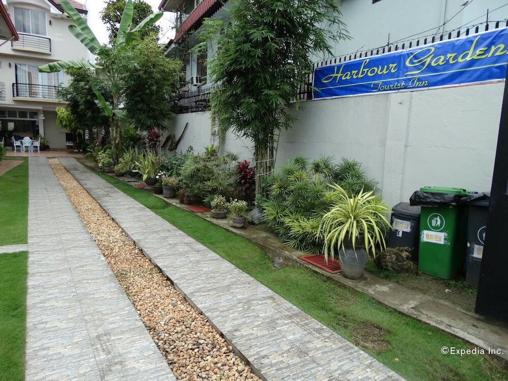 Фото Harbour Gardens Tourist Inn