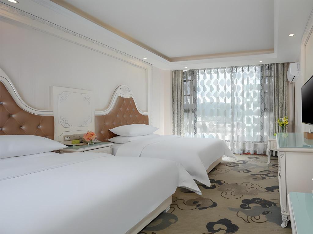 Фото Vienna Classic Hotel Kunming Airport Branch