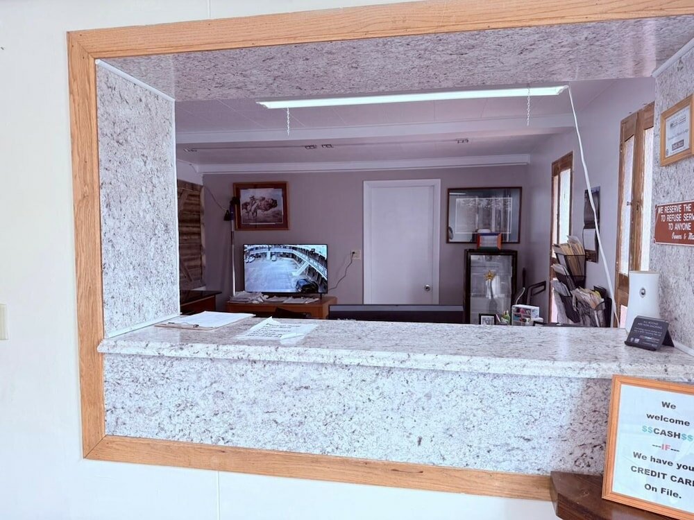 Фото Tomahawk Motor Lodge