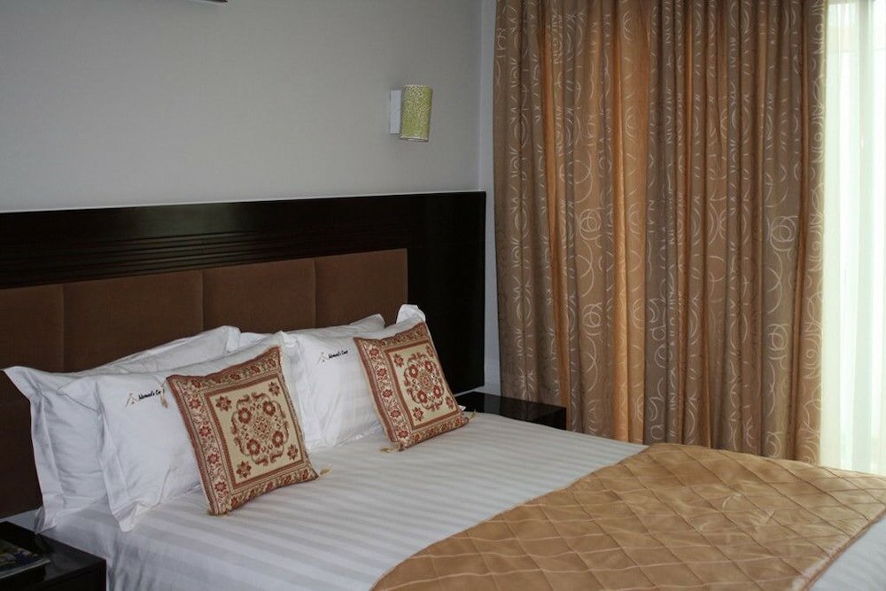 Фото Nomad's Court Lodge