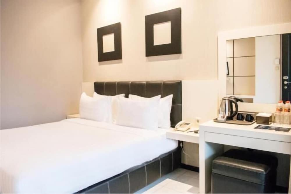 Фото Luminor Hotel Jember