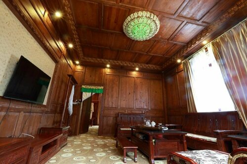 Гостиница Shangri La Bala Ancient Village View Hotel в Дечене