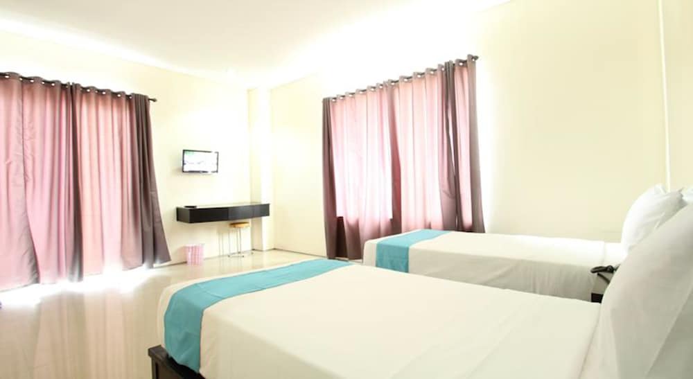 Фото Kuta Airport Insta Hotel