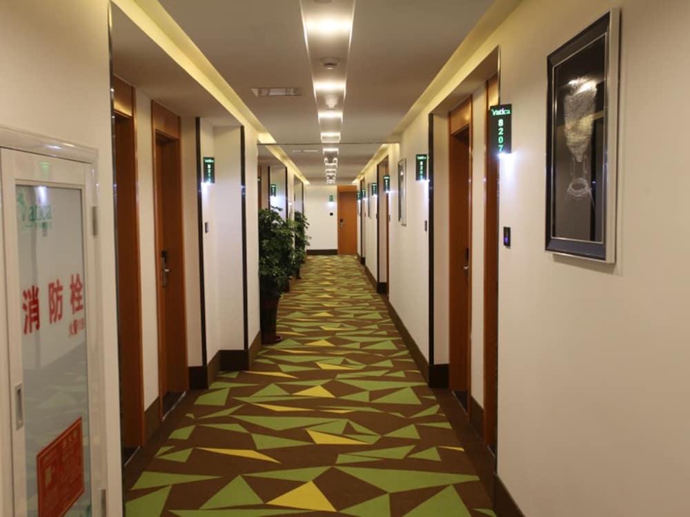 Фото Vatica ZaoZhuang TengZhou Railway Station Hotel