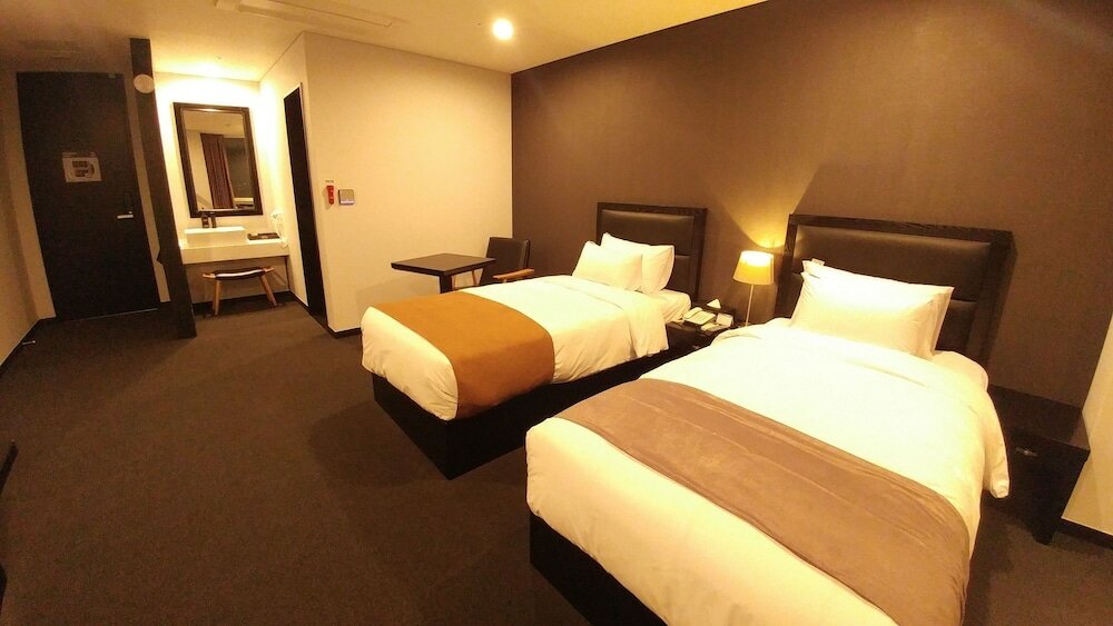 Фото Gangneung Tourist Hotel