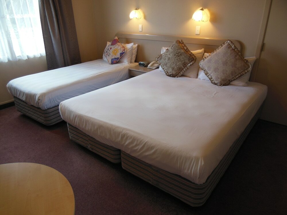 Фото Asure Camelot Arms Motor Lodge