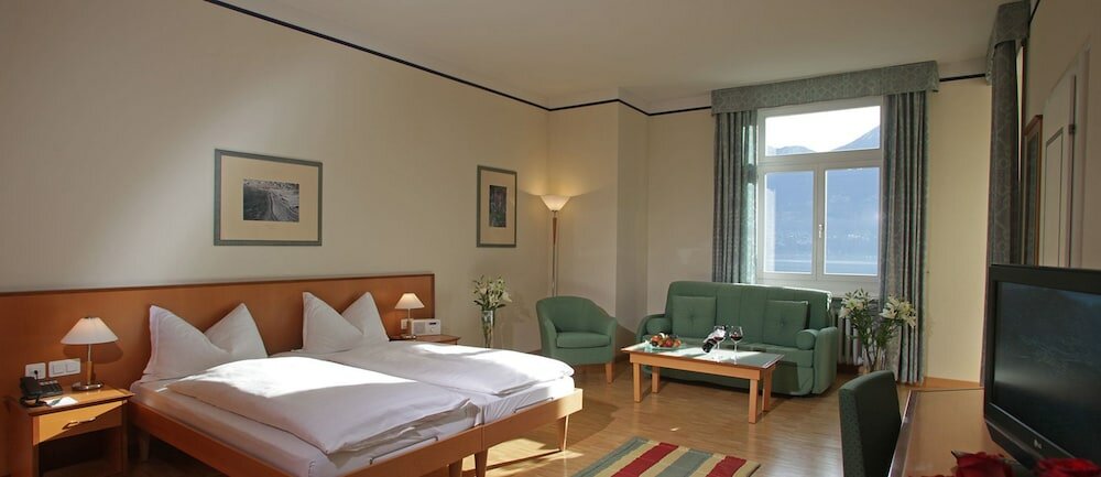 Фото E-Rooms Minusio