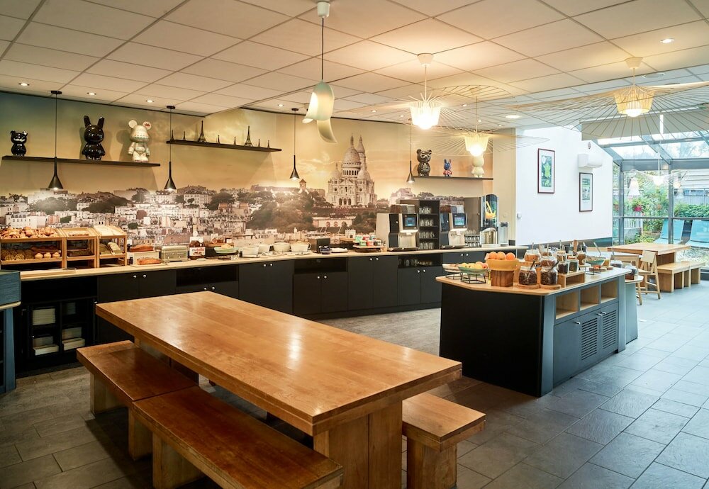 Фото Novotel Suites Paris Nord 18ème Hotel