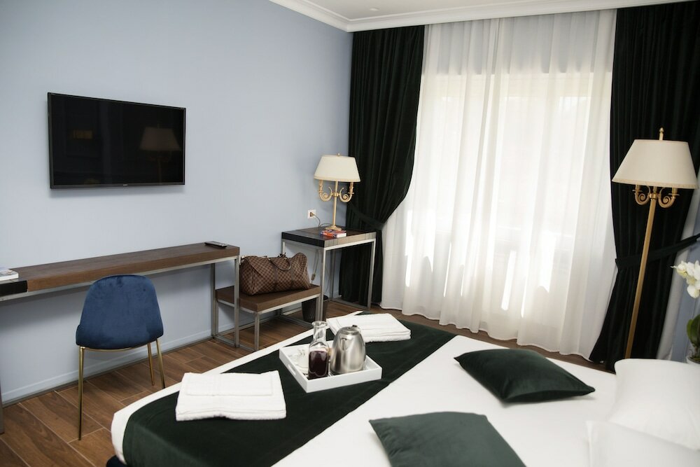 Фото Unicum Roma Suites