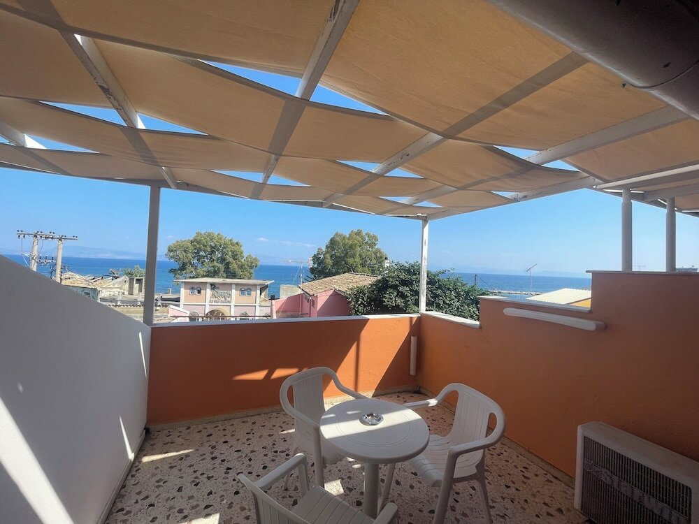 Фото Benitses Arches