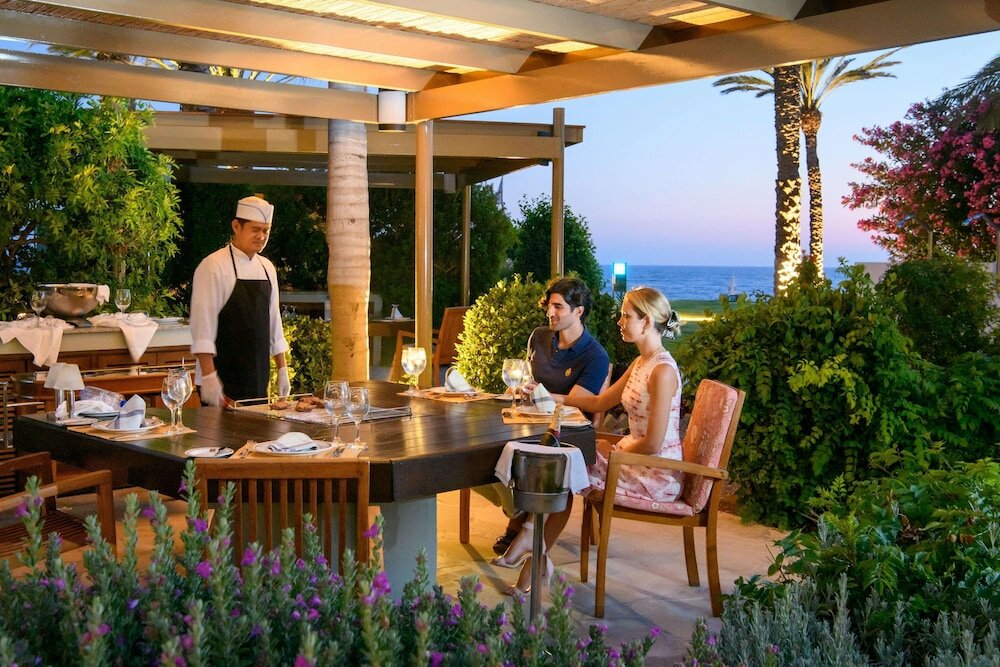 Фото Constantinou Bros Athena Beach Hotel