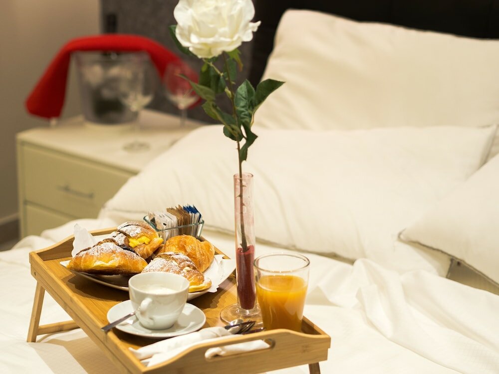 Фото Operà Suites Roma