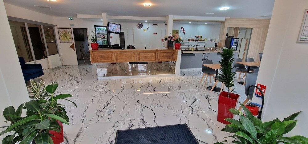 Фото Kyriad Direct Arpajon