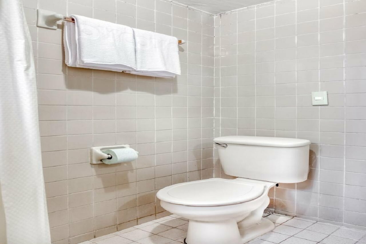 Фото Capital O Hotel La Siesta, Gómez Palacio