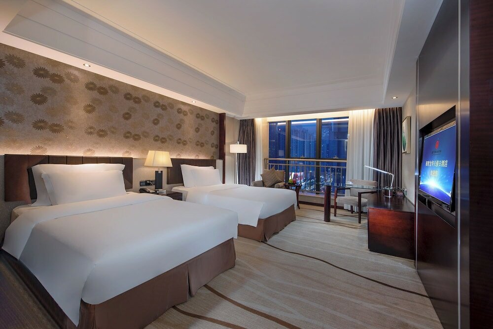 Фото Fuqinglong Huatian Holiday Hotel