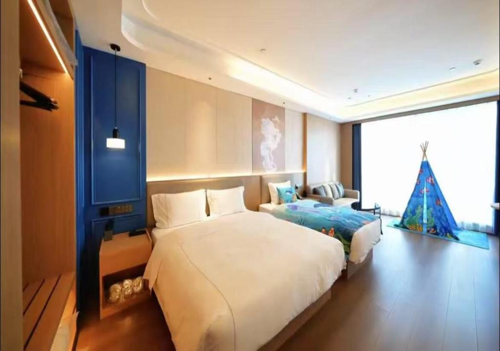 Фото Microtel by Wyndham Qingdao Huangdao