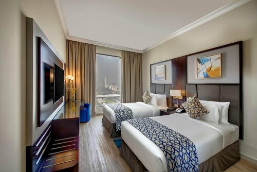 Внешний вид отеля Two Seasons Hotel & Apartments в Ас-Сафухе, фото 3