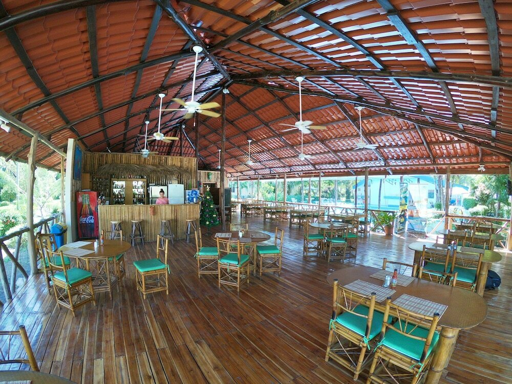 Фото Cocomar Beachfront Hotel and Island Resort