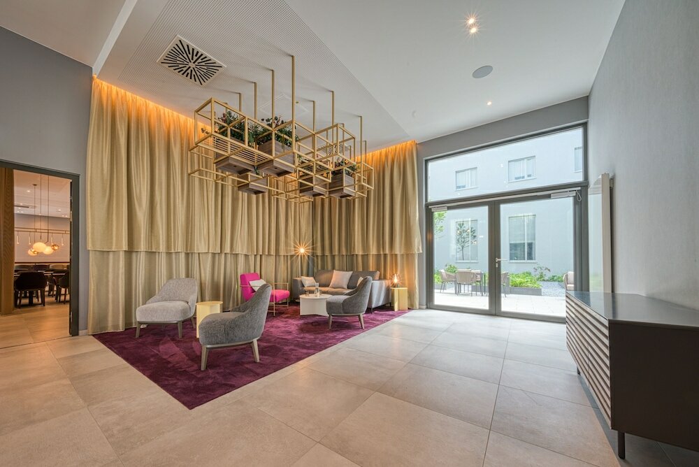 Фото Plaza Premium Muenchen