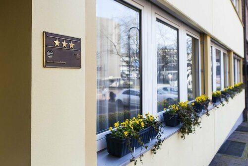 Гостиница Hotel am Düsseldorf Platz в Ратингене