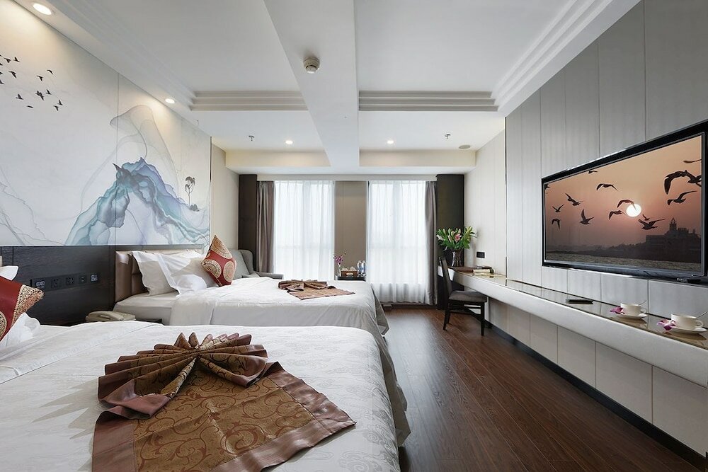 Фото Xiamen Hooray Hotel