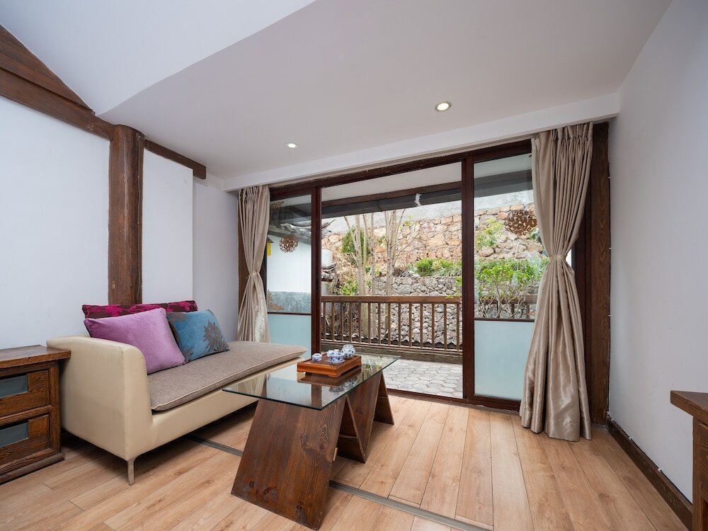 Фото Merry Inn Lijiang