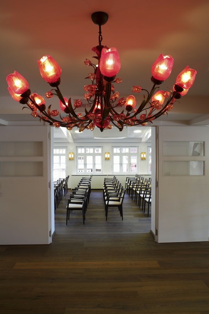 Фото Romantik Residenz Ferienwohnungen Hotel Im Weissen Rössl