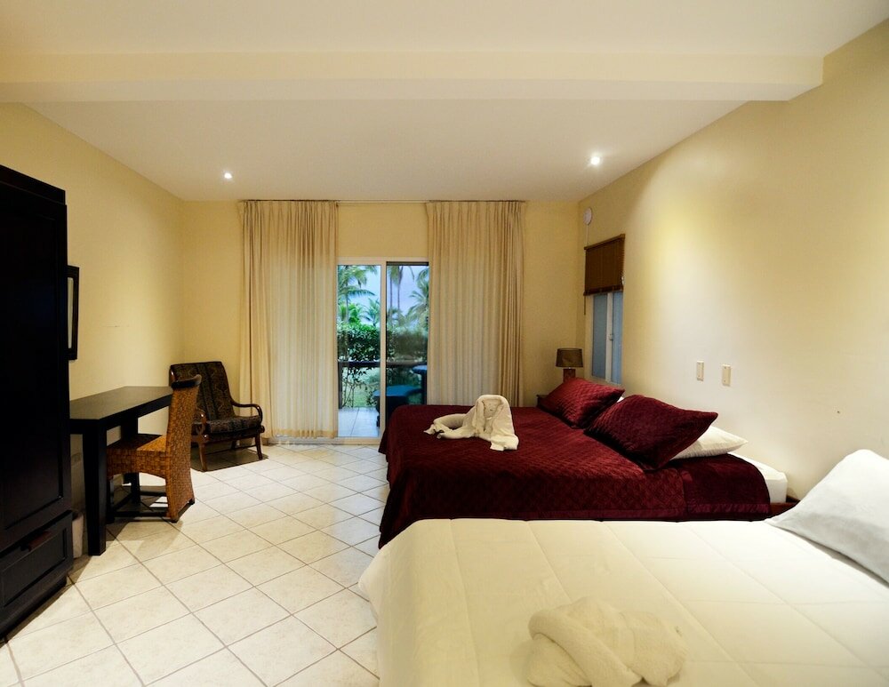 Фото Cocomar Beachfront Hotel and Island Resort