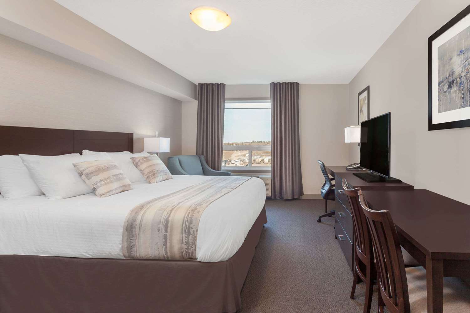 Фото Ramada by Wyndham Grassland