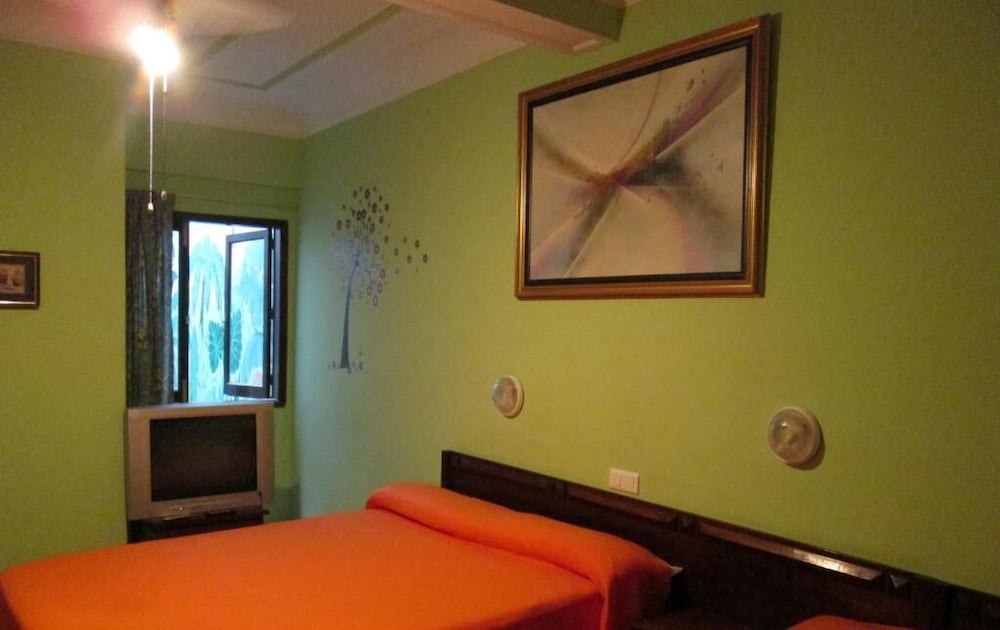 Фото Pensión Sea of Clouds