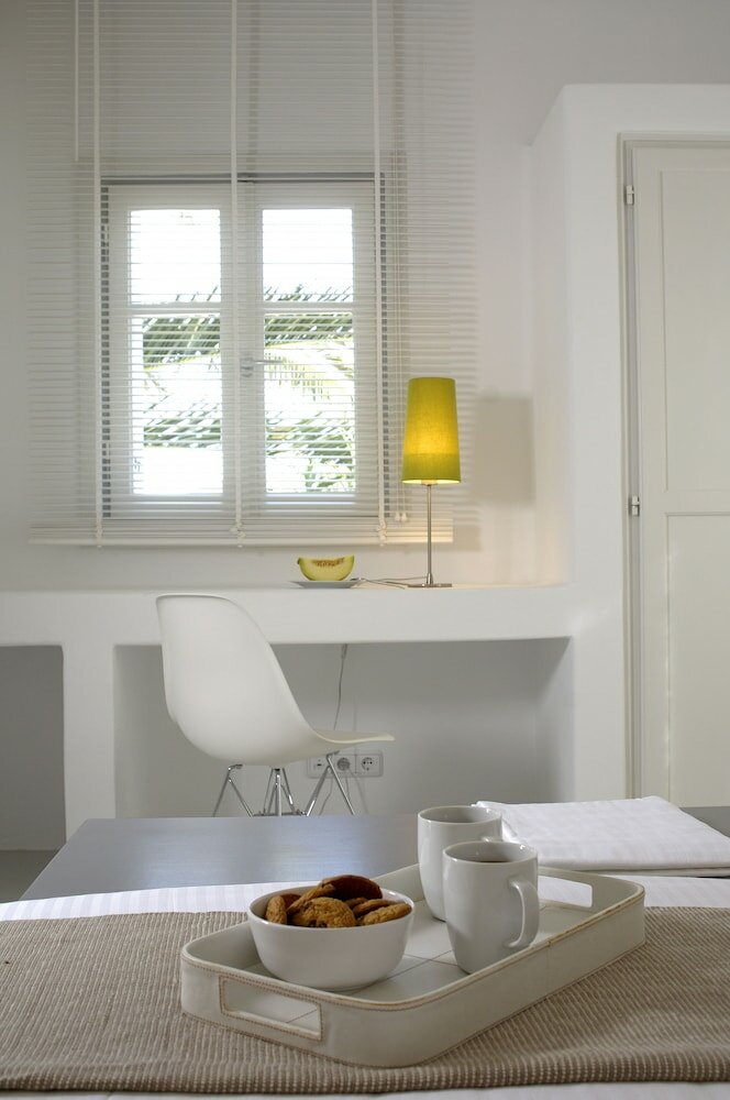 Фото Kapetan Tasos Suites