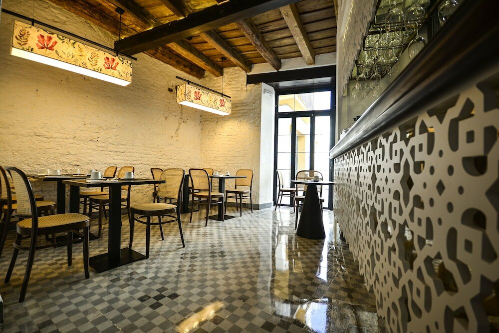 Фото Legado Alcázar Hotel