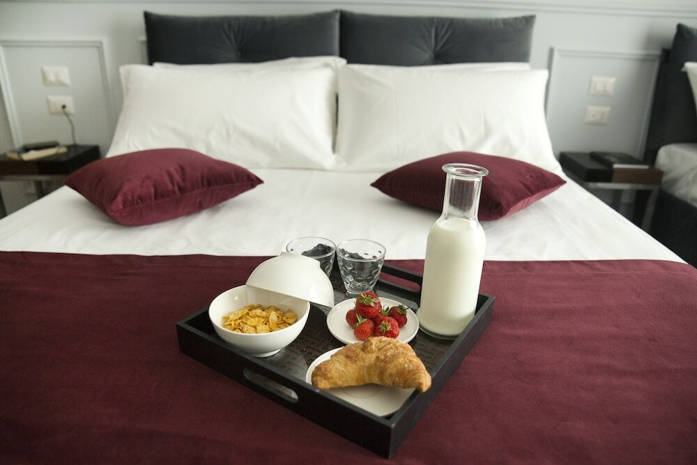 Фото Unicum Roma Suites