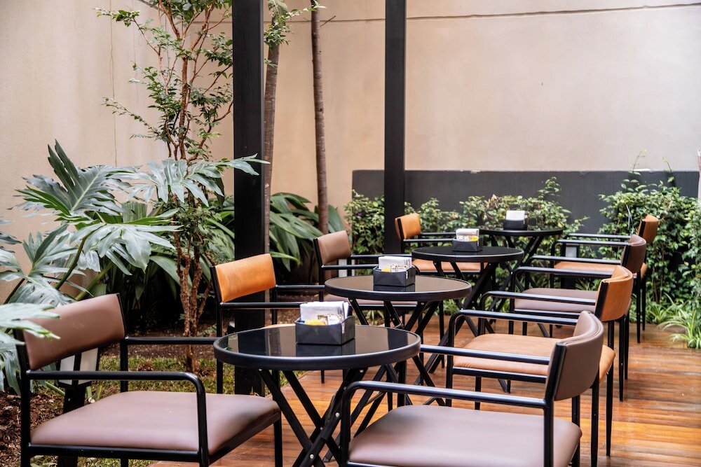 Фото Cozzy Suítes Paraíso Hotel