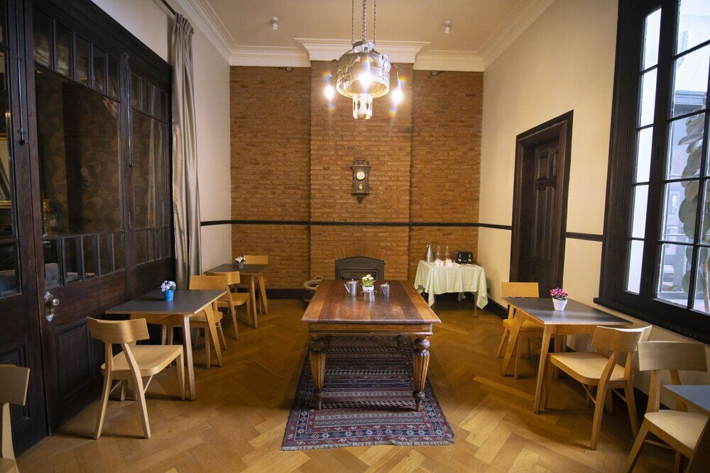 Фото New Voga Guesthouse