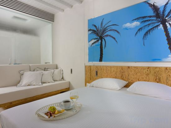 Фото Mykonos Dove Beachfront Hotel