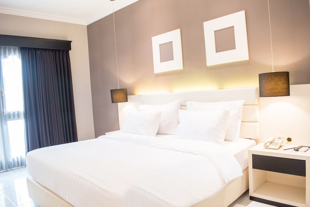 Фото Luminor Hotel Jember