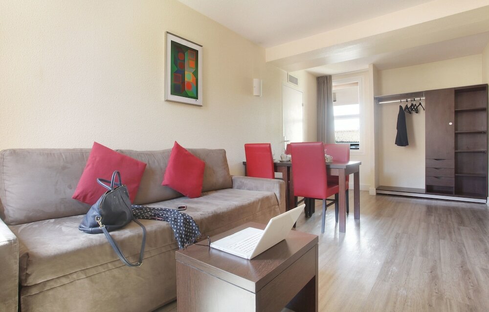 Фото Appart'hôtel Odalys City L'Atrium