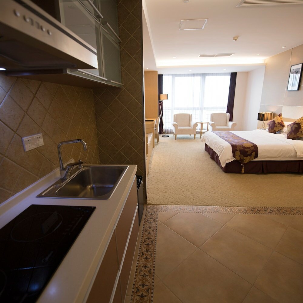 Фото Suzhou Sun Plaza Hotel