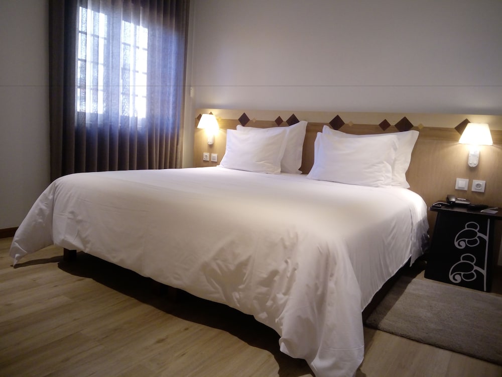 Фото Aveiro Center Hotel