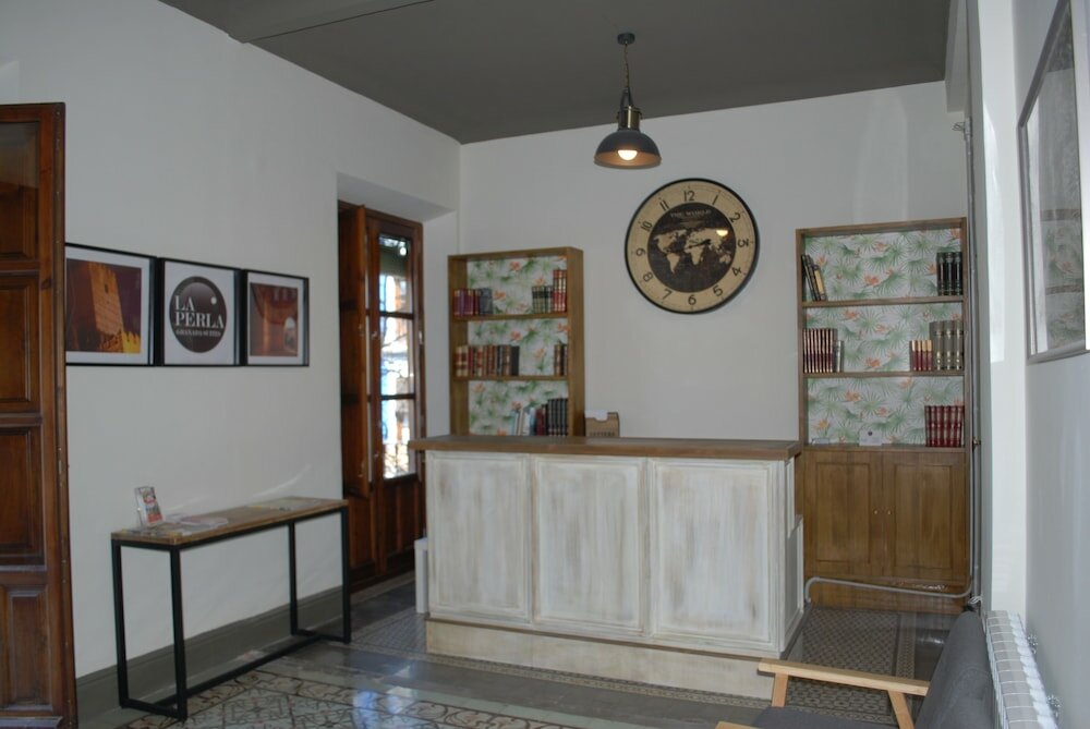 Фото La Perla Granada Suites