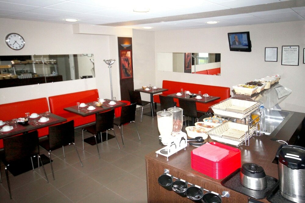 Фото Séjours & Affaires Reims Clairmarais