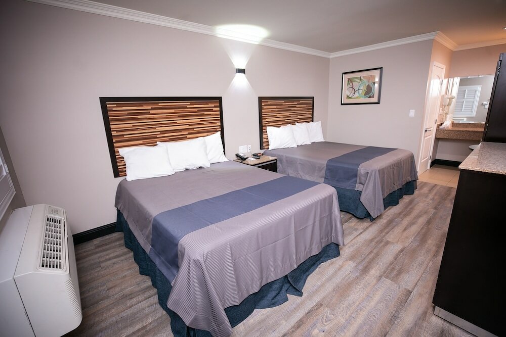 Фото Diamond Bell Inn & Suites