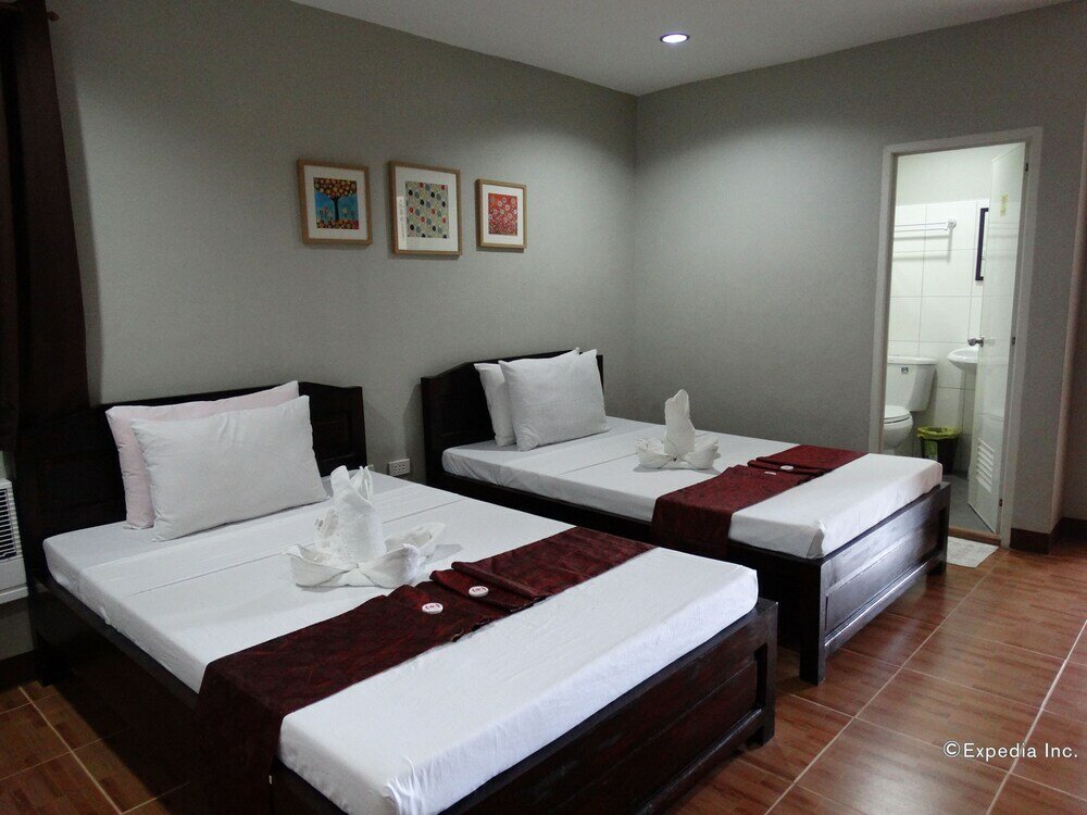 Фото Harbour Gardens Tourist Inn