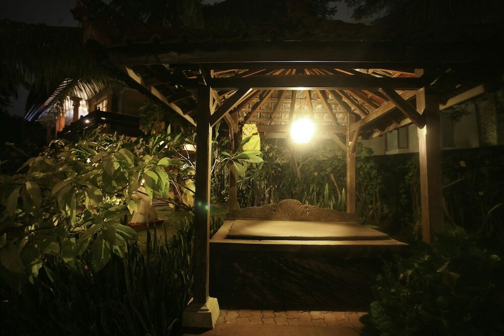 Фото Puri Naga Beachfront Cottages