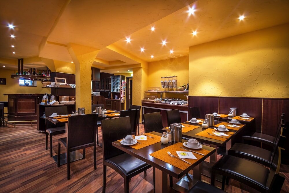 Фото Hotel am Wilhelmsplatz