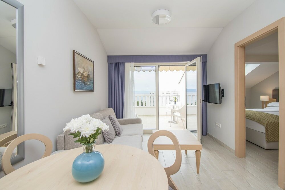 Фото Aparthotel Flora