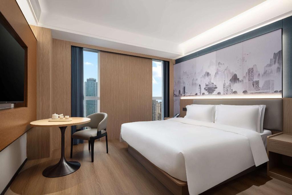 Фото Microtel by Wyndham Qingdao Huangdao